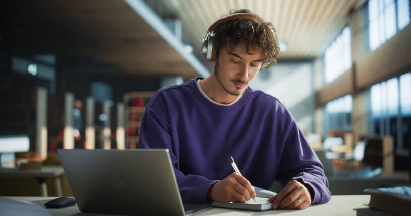 A student researching diploma programs at the Academy of learning career college.